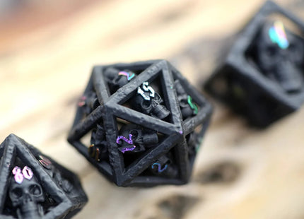 Gamers Guild AZ HYMGHO Skull's Grin Hollow Metal Dice Set - Black with Chromatic HYMGHO