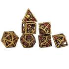 Gamers Guild AZ HYMGHO Skull's Grin Hollow Metal Dice Set - Gold with Red HYMGHO